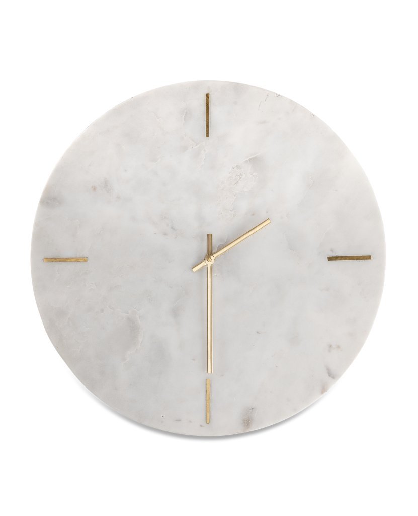 Horloge en marbre blanc, Riccia Nkuku