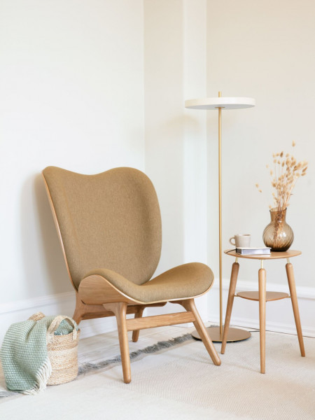Umage  A conversation piece natural oak and brown sugar textile armchair