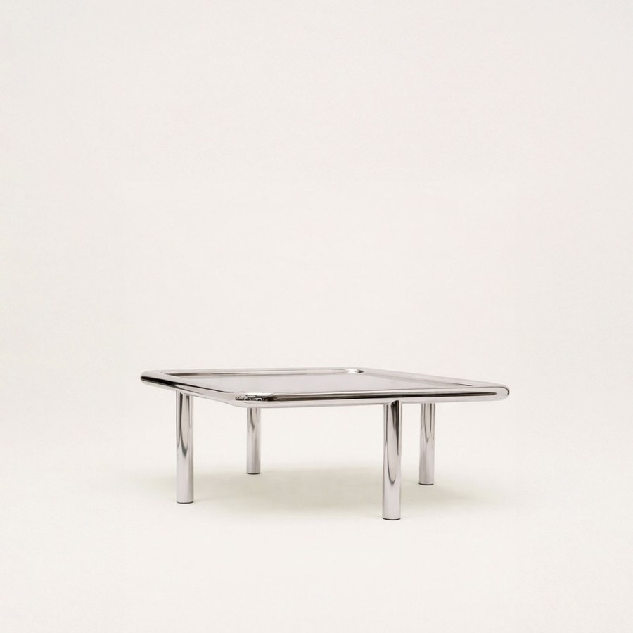 Table basse Alix Gabrielle Paris structure inox poli